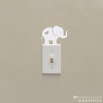 Elephant decal with heart on its butt.